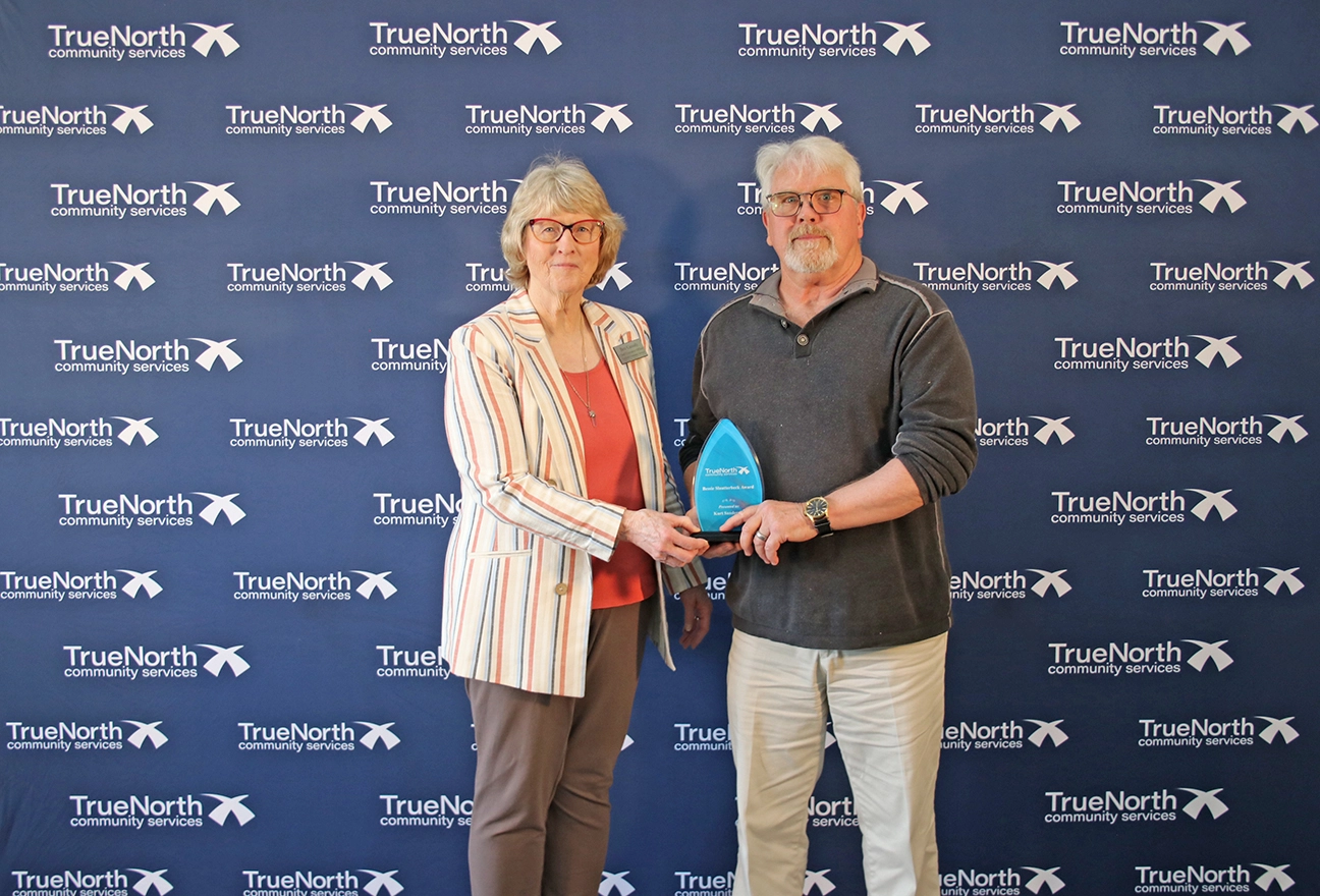 TrueNorth COE, Bev Cassidy, at left, with Bessie Slautterback award winner, Kurt Sanderson, at right
