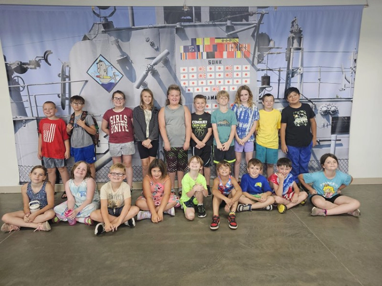 A group of youth from our Out-of-School Time program pose during a field trip